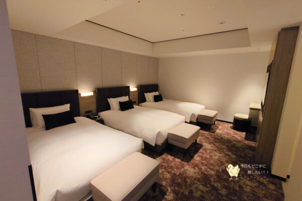 ソラリア西鉄ホテル札幌のデラックストリプルのベッドルーム