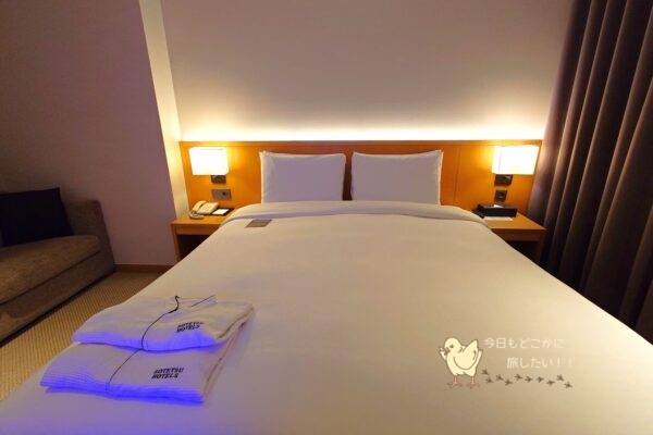 相鉄ホテルズ ザ・スプラジール ソウル東大門のデラックスダブルのキングベッド